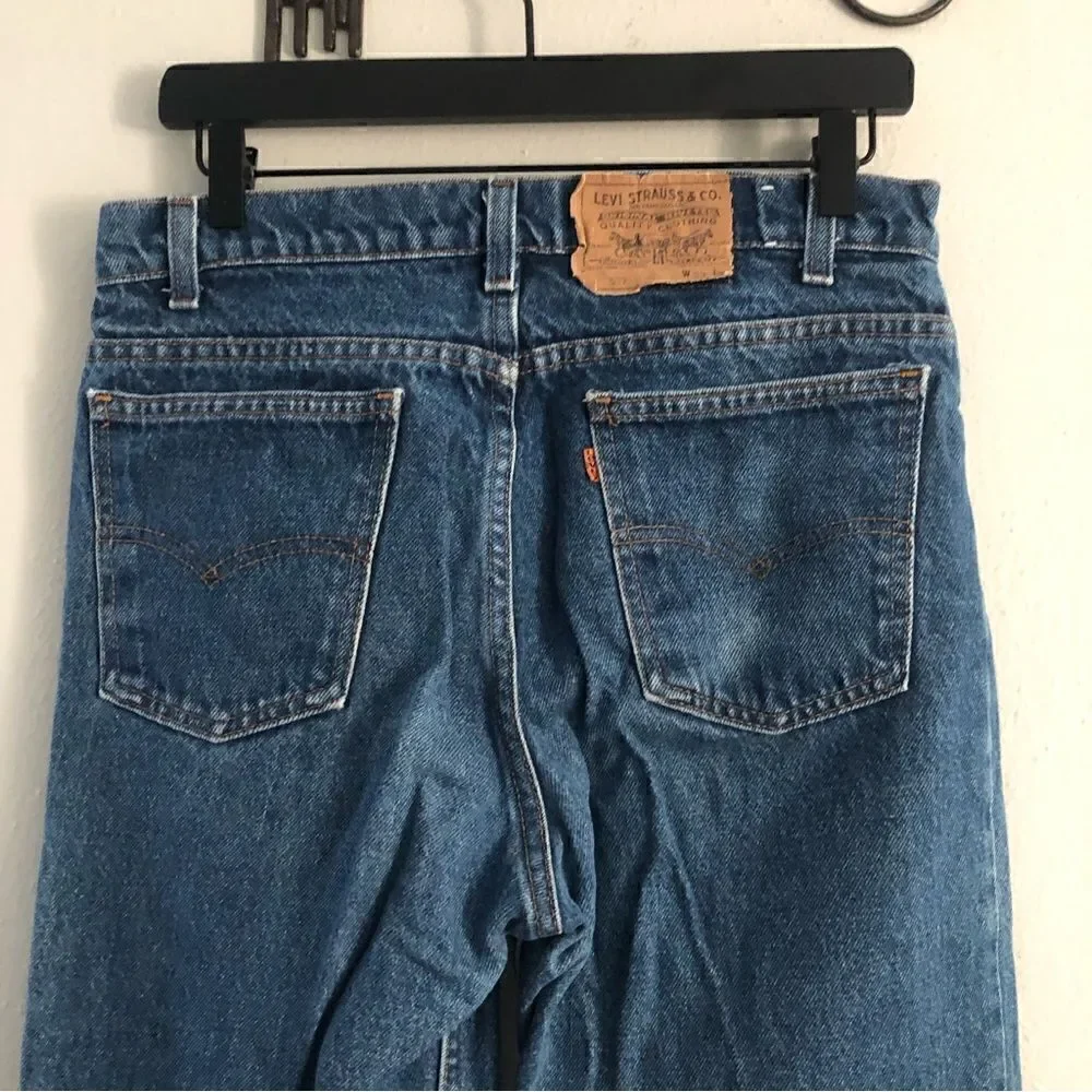 Vintage Levi’s 509 orange tag medium blue wash denim jeans size 33x31